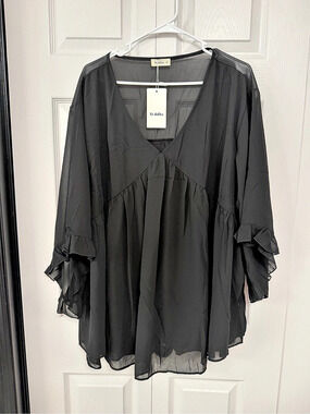 Women’s Siddhe Chiffon Ruffle Sleeve Blouse in Black.